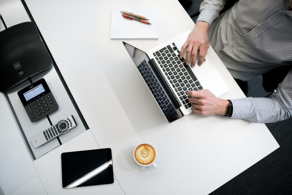 Person typing on a laptop